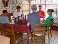 playing a game at the kitchen table